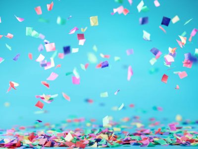 confetti falling from above and collecting on surface