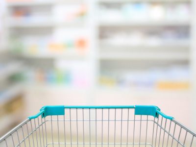 shopping cart with blurry shelves in distance