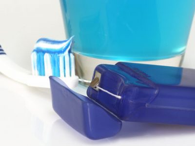 toothbrush, floss and mouthwash