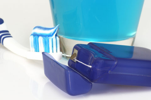 toothbrush, floss and mouthwash